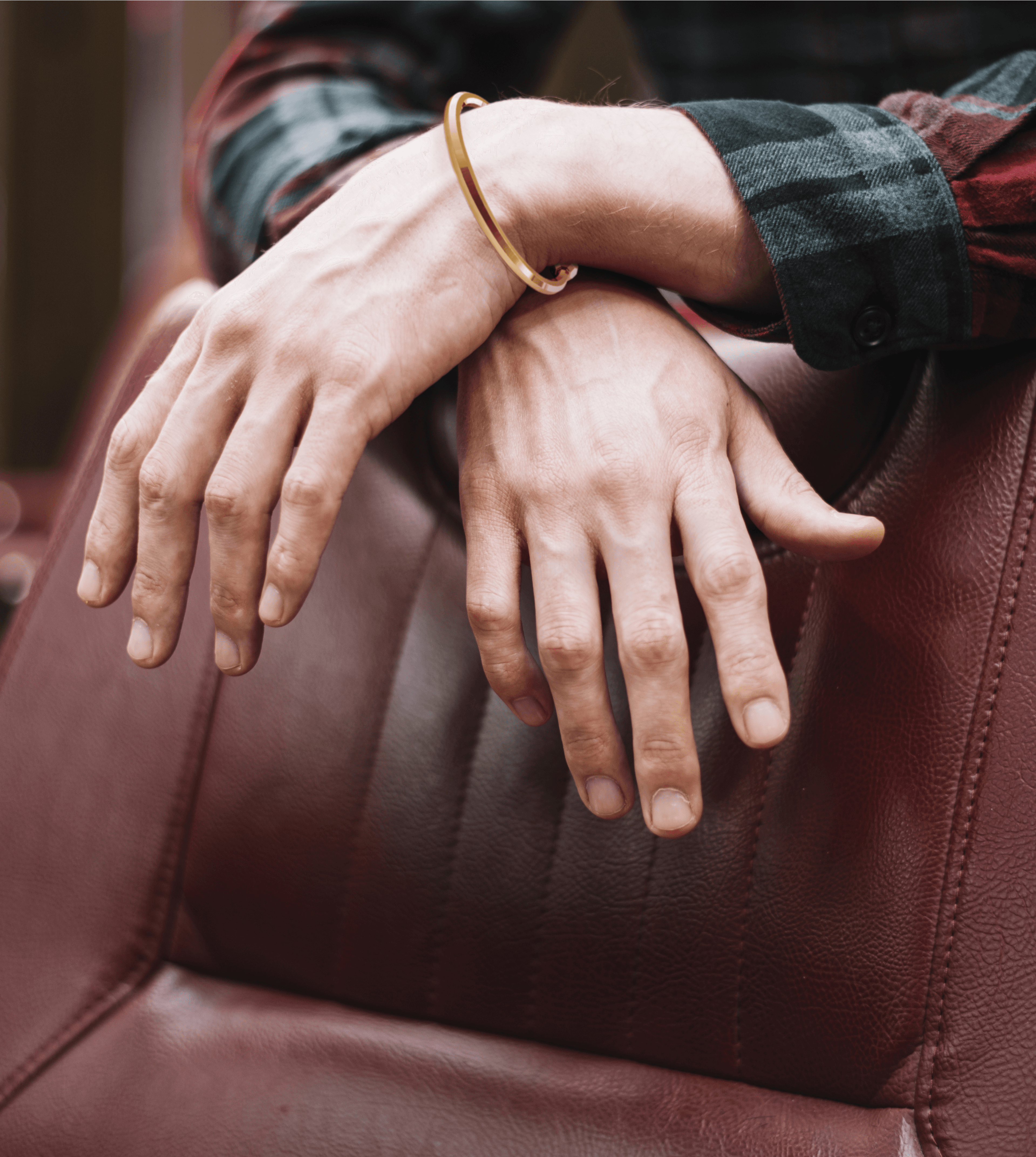 Hands wearing RAND79 jewelry